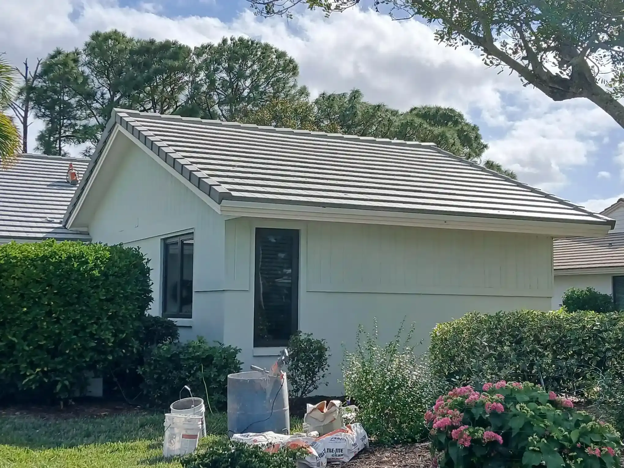 Gray flat tile re-roof on a home